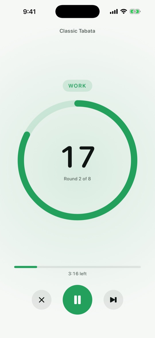 A workout in progress: the green countdown ring in the work phase, round 2 of 8.